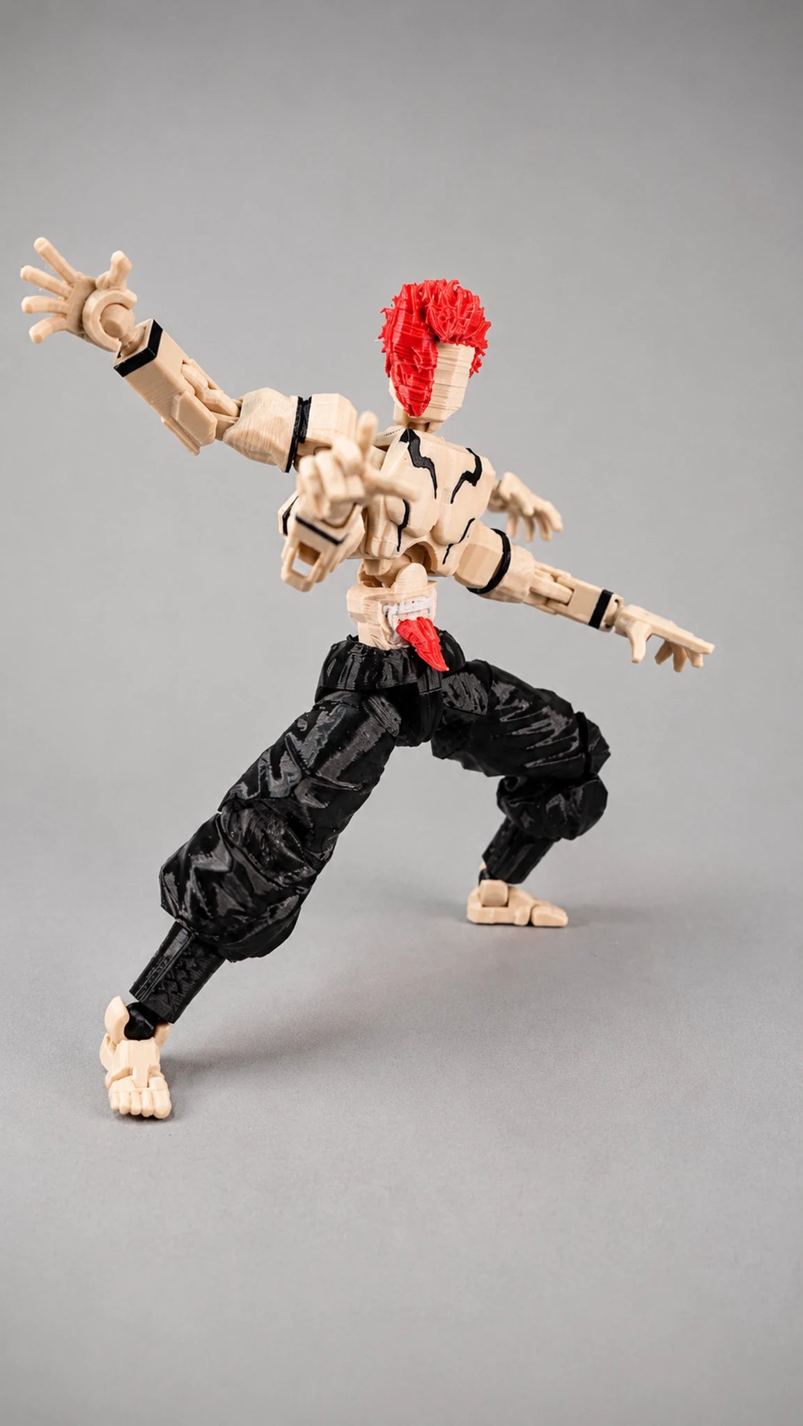 Dummy 13 Rey de las Maldiciones en pose de combate
