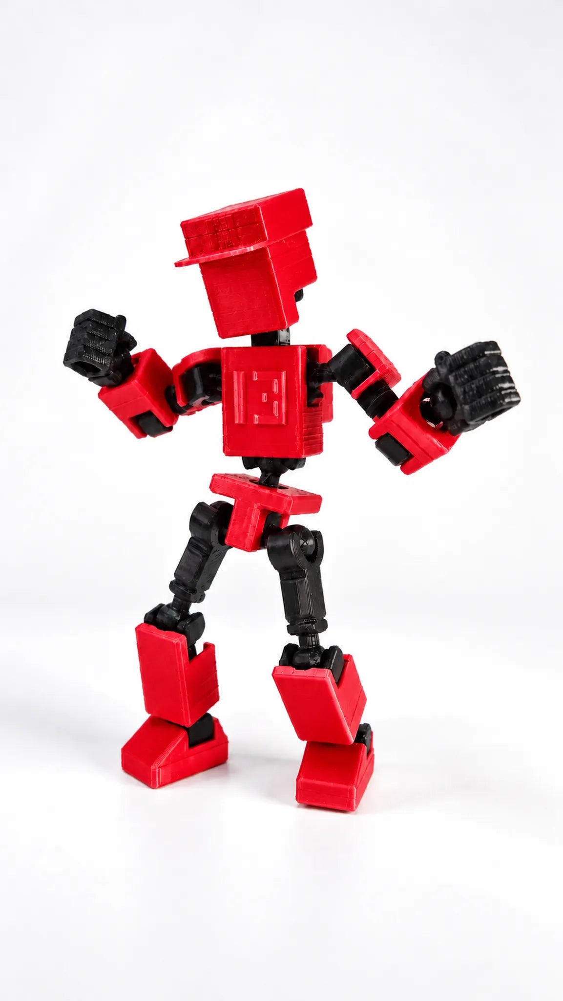 Mini T13 rojo figura articulada en pose de acción